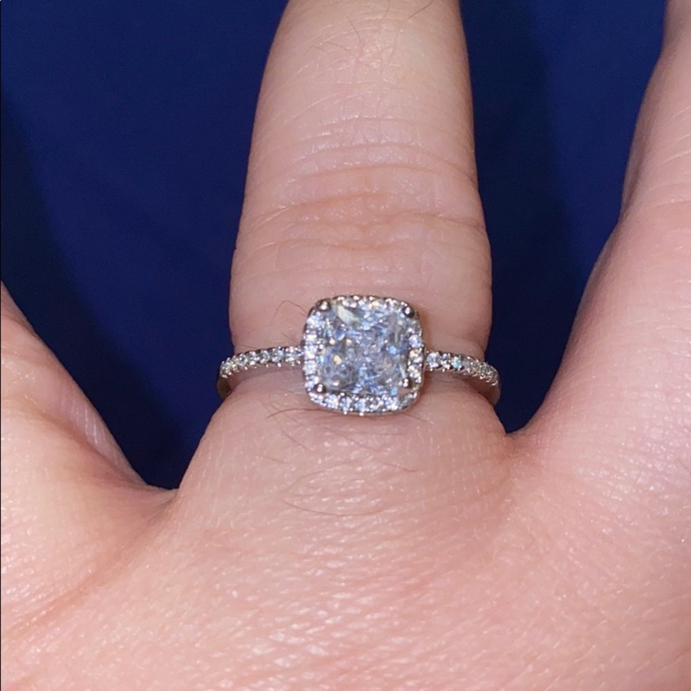 Simulated diamond in silver ring